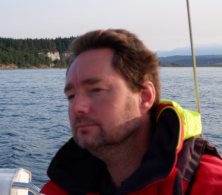 Exceptionally good looking sailor gazes into middle distance